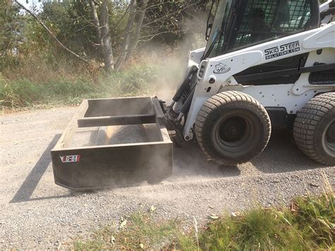 skid steer gravel spreader|best grader for skid steer.